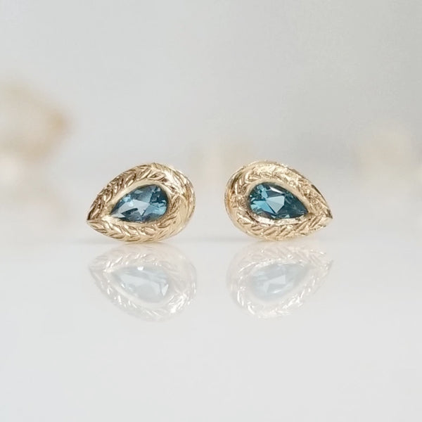 Swiss Blue Topaz Stud Earrings in hand engraved 14k Yellow Gold